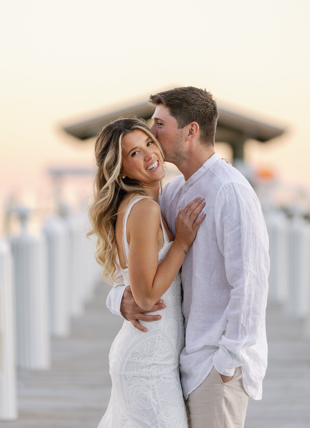 Laura and Abraham sharing a romantic moment during golden hour at Cheeca Lodge Resort.