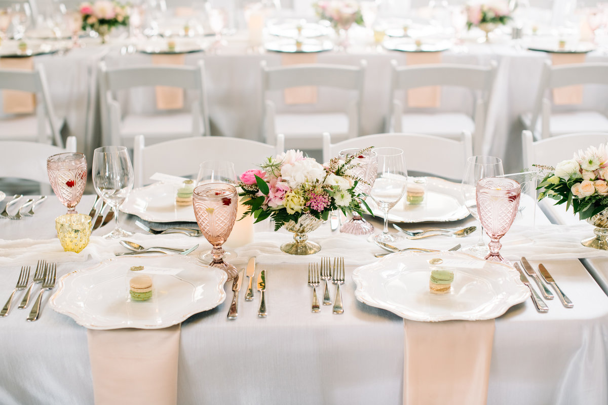 Bright and colourful wedding reception decor by Moments by Madeleine, a romantic and elegant wedding planner based in Calgary, Alberta. Featured on the Brontë Bride Vendor Guide.