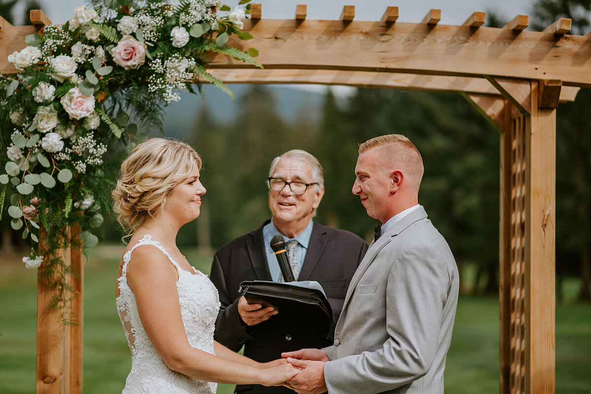 Couple during their ceremony  at their Roerts Creek wedding on the Sunshine Coast B.C