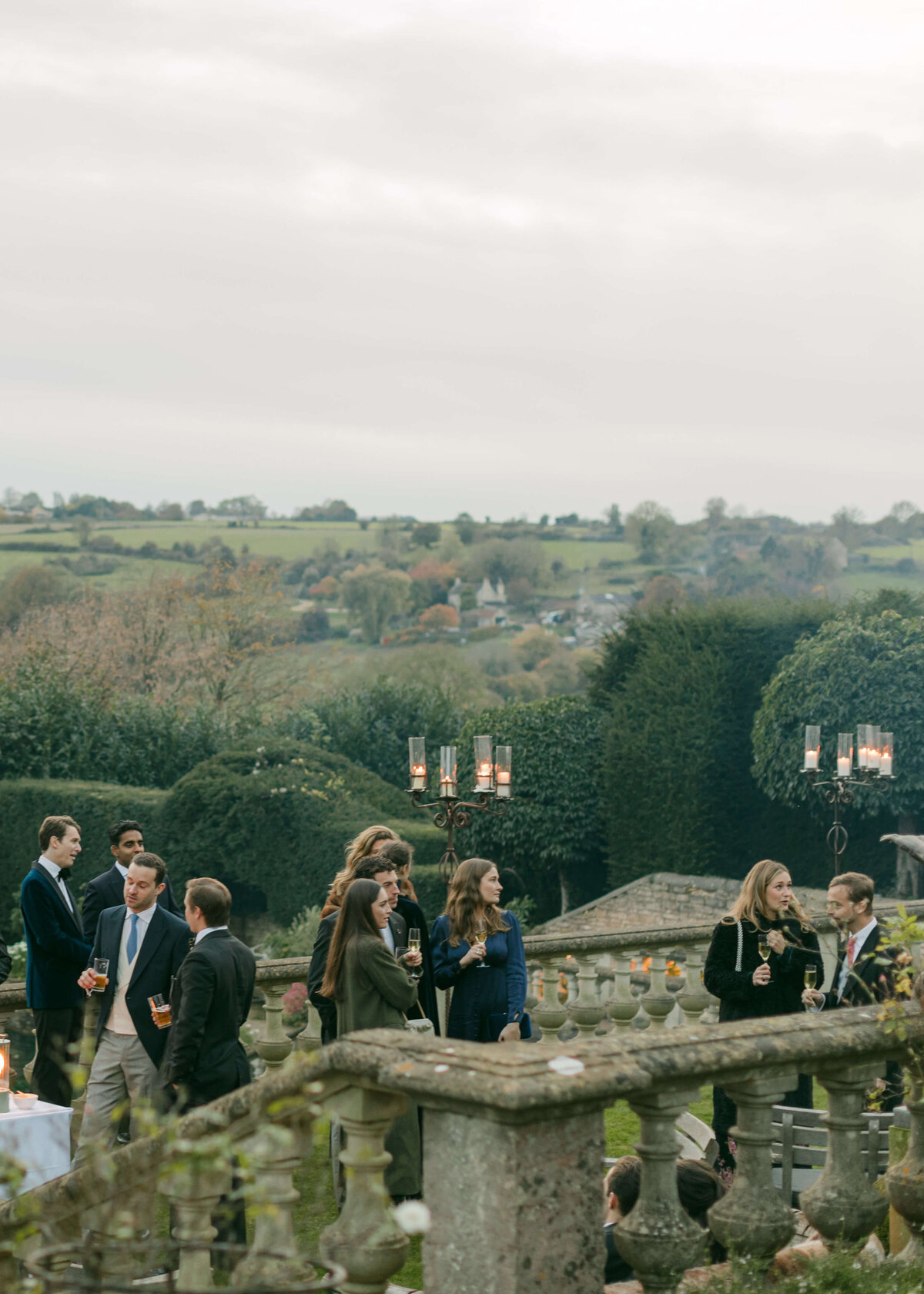 chloe-lowe-wedding-euridge-manor-cotswolds-drinks-reception-terrace