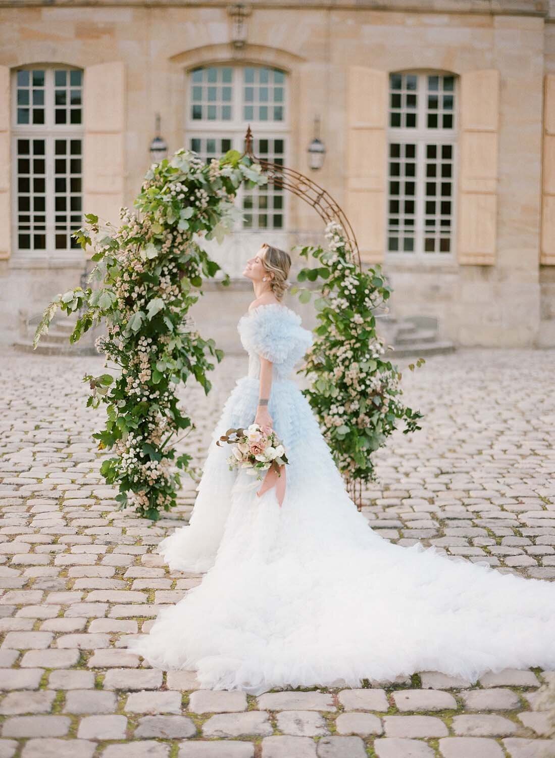 wedding romantic ceremony arch at chateau de villette
