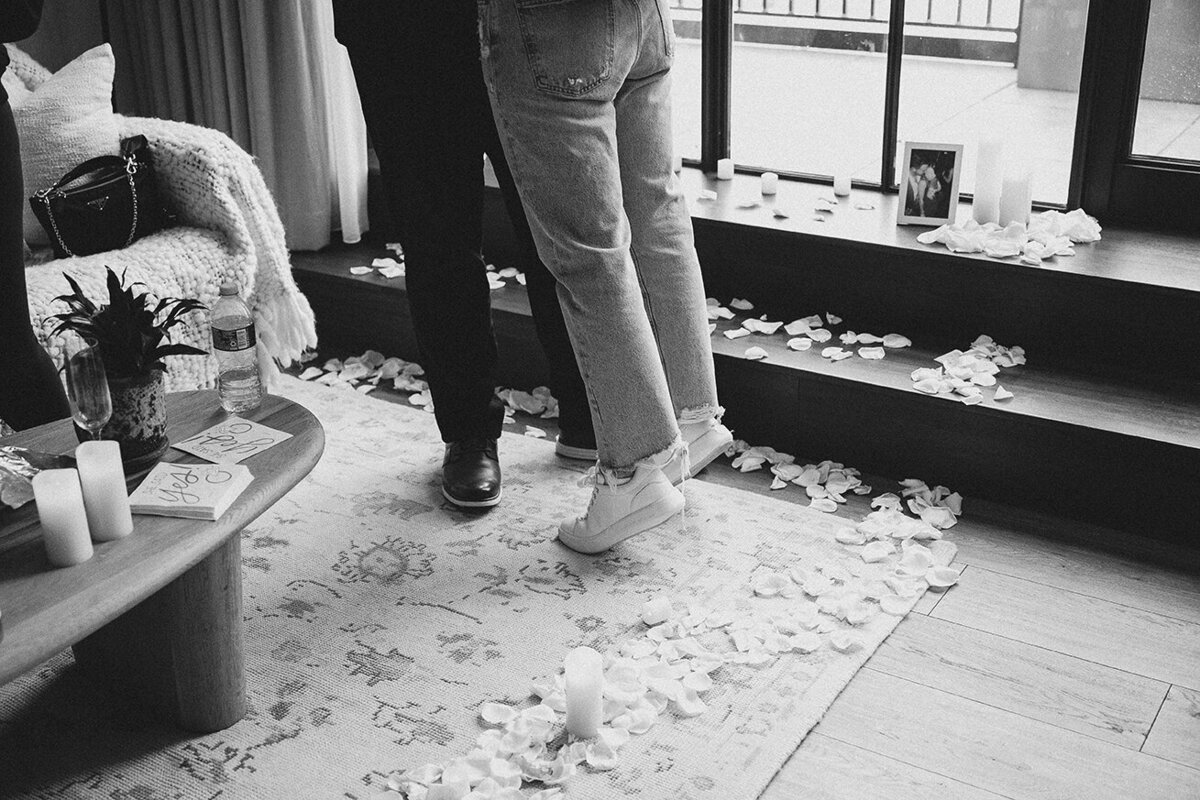 Mira Park Photography NY based wedding photographer Black and white photo of wedding proposal in 1 Hotel in Central Park, NY