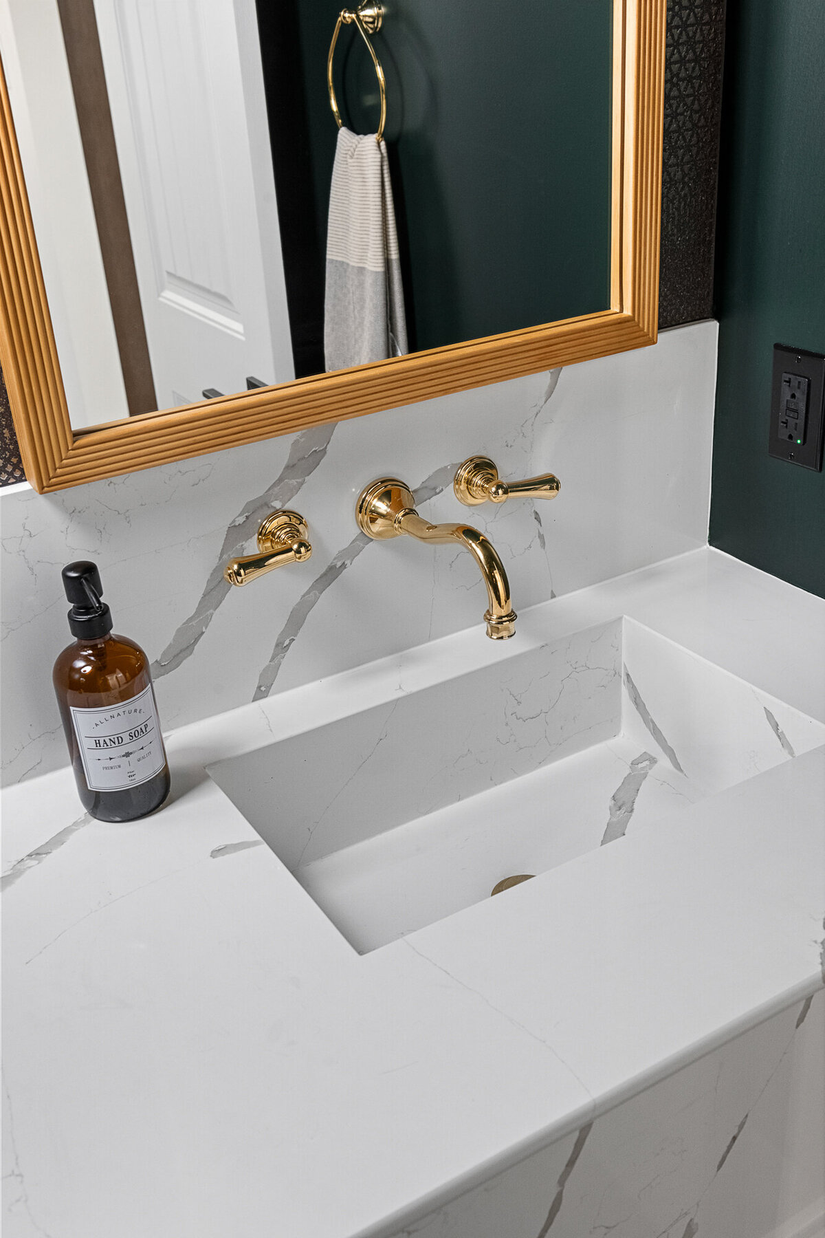 Final image of our moody luxe powder room interior design project.