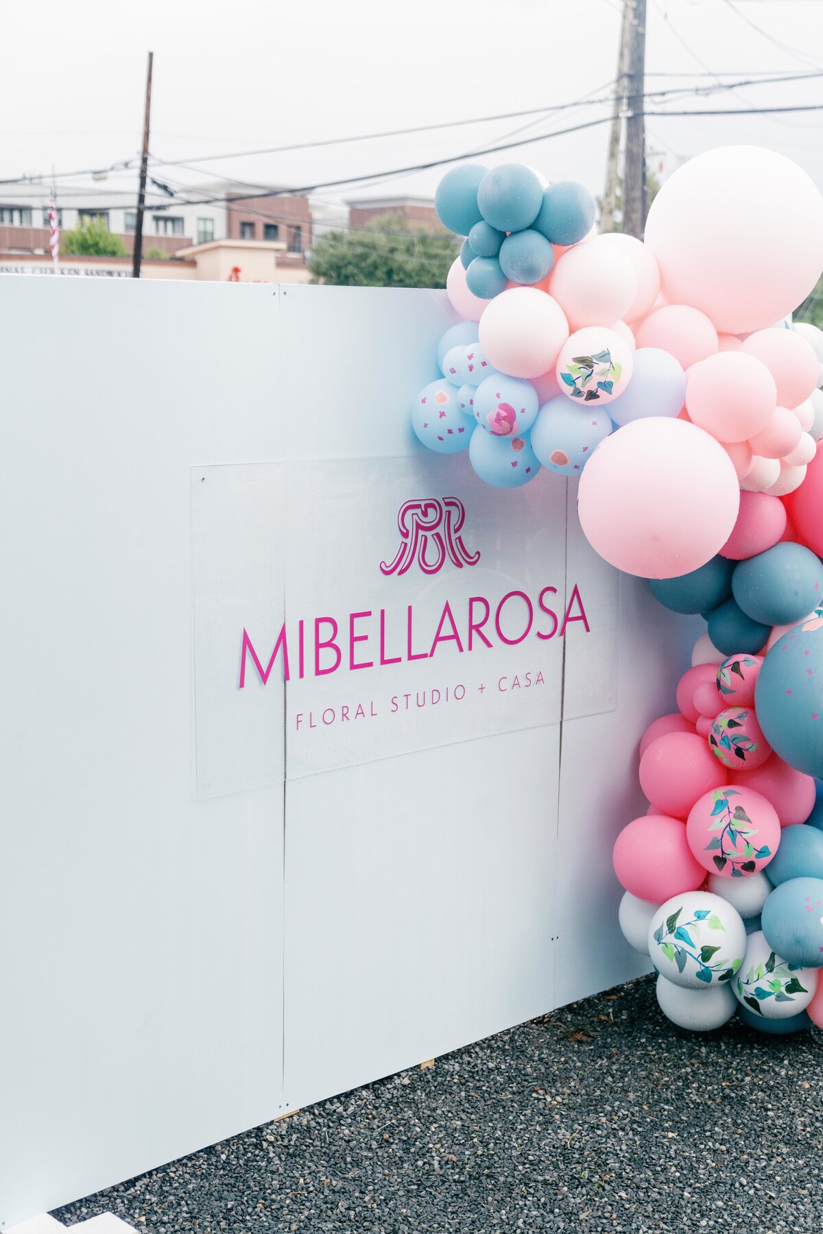 Mibellarosa floral studio and casa white event backdrop with pink and blue balloon arch