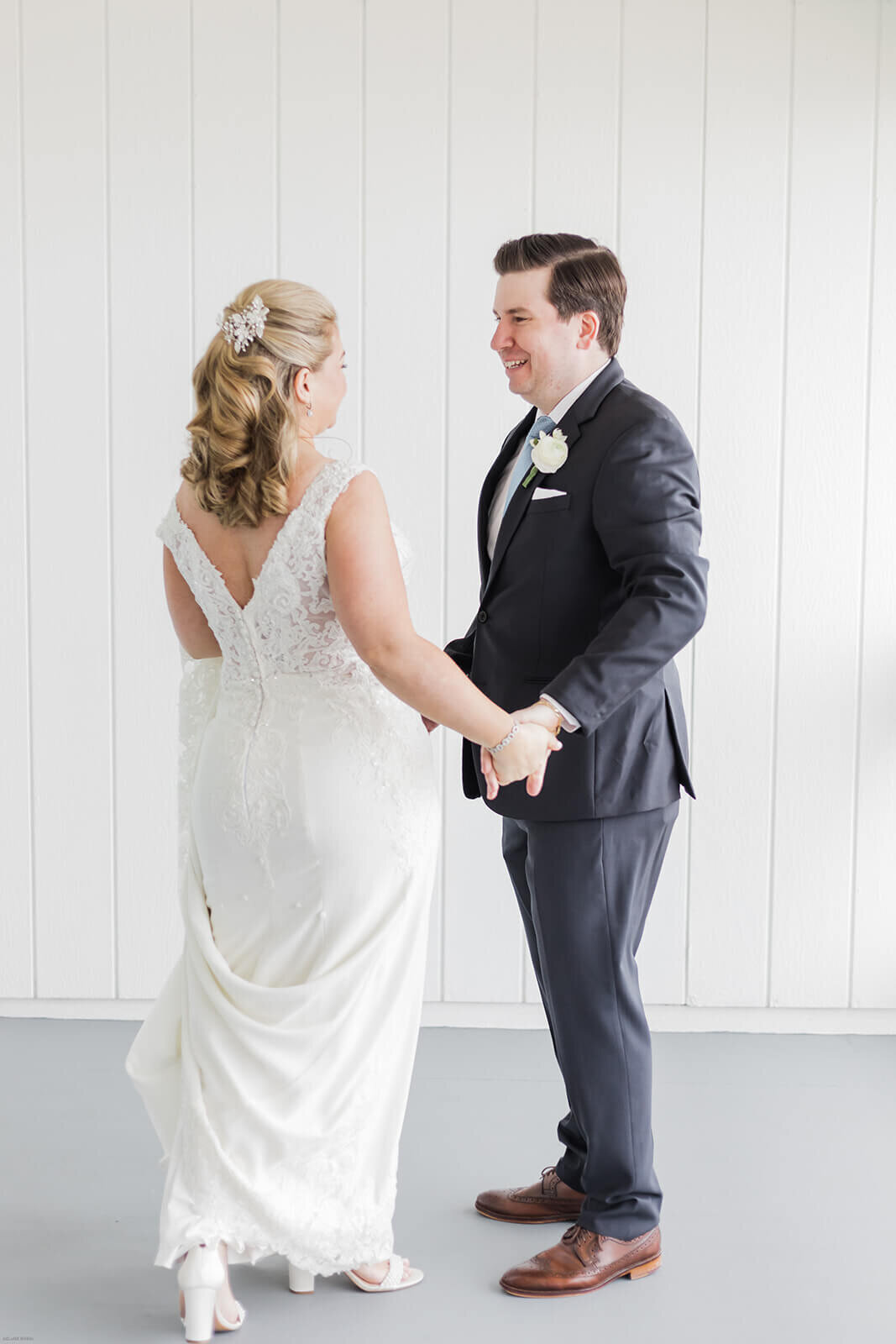 Bride and groom after first look at Long Island wedding