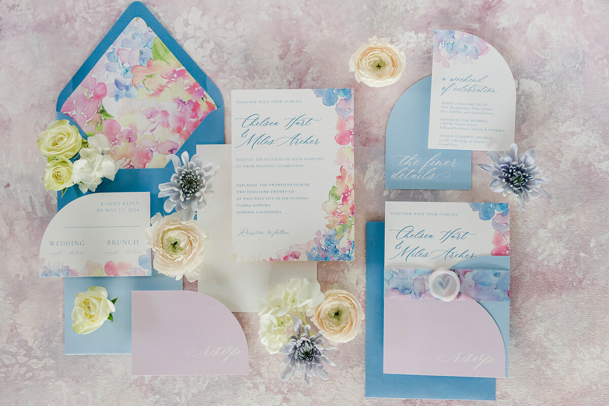 full-suite-watercolor-wedding-invitation-flatlay