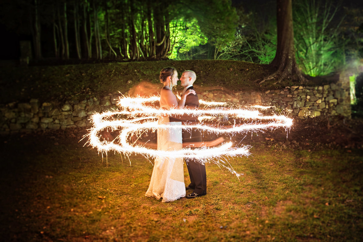 Sparklers surround a newly married couple at Ridley Creek Mansion in PA.