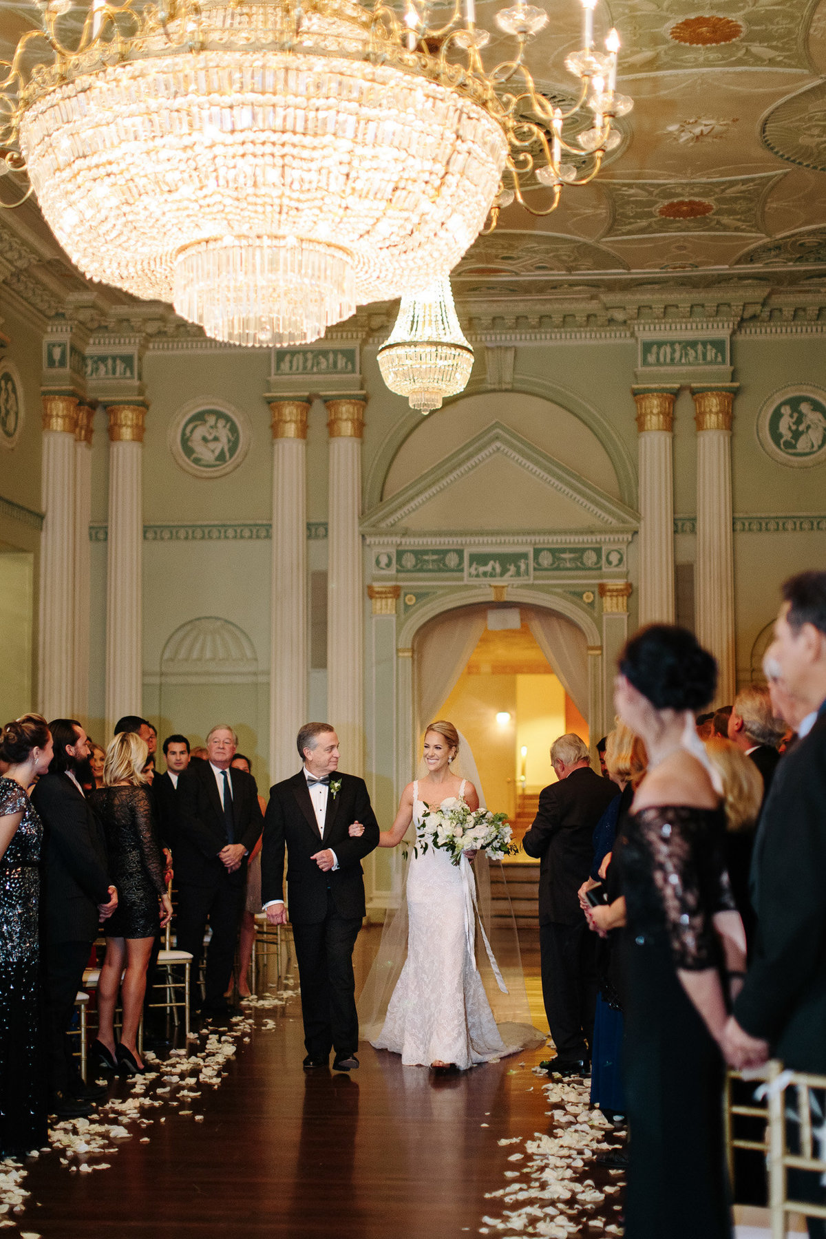 Rebecca Cerasani captures bride and father walking down the aisle in the Georgian Ballroom at the Biltmore Atlanta.