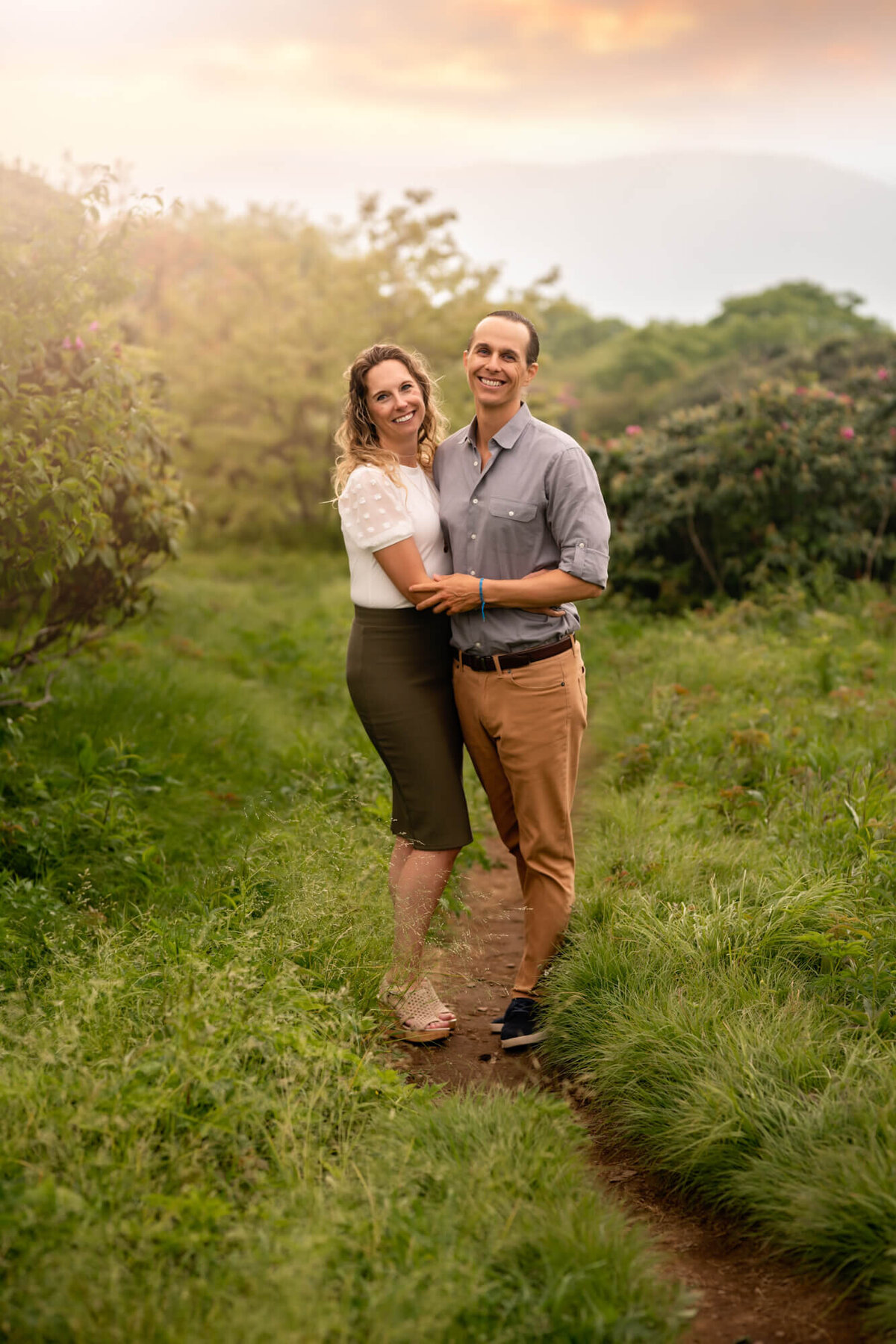 A handsome couple on a trail at the bald at Craggy Gardens