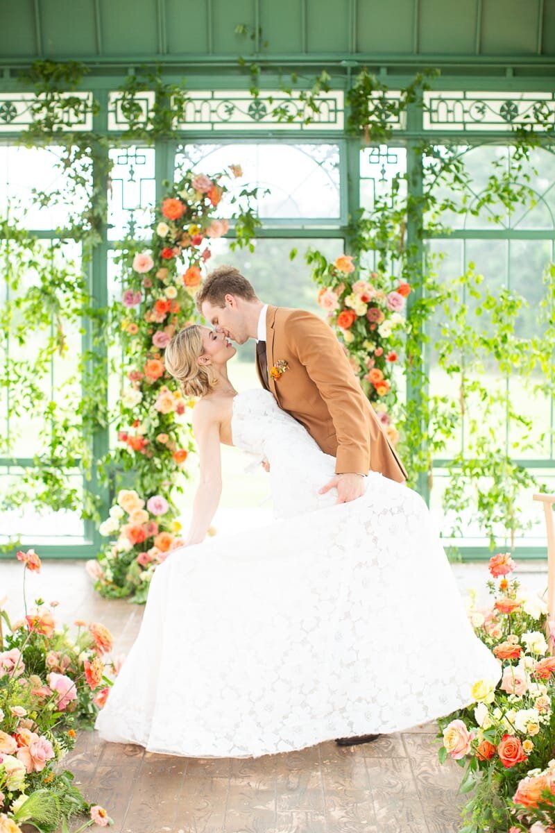 bride-groom-aisle-meadow-statement-floral-arch