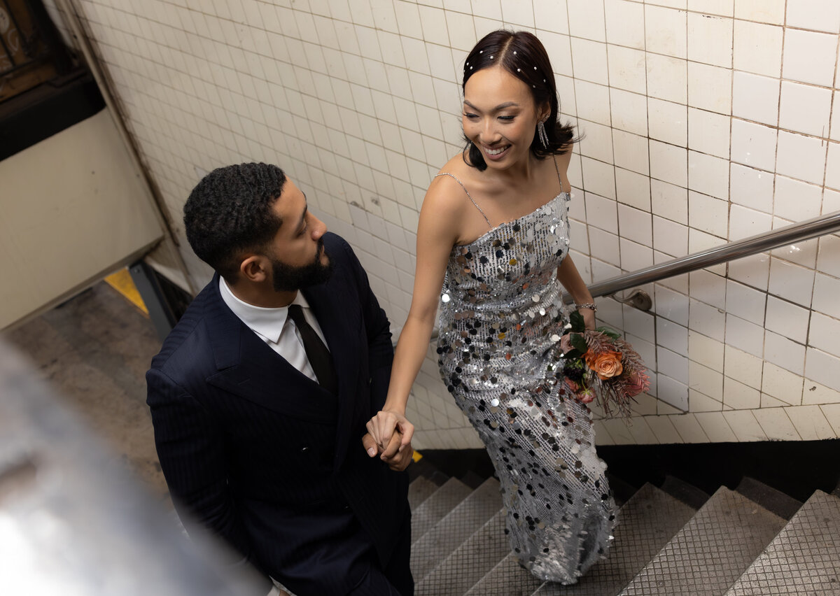 Modern, urban editorial elopement session on the NYC subway, capturing bold style and romantic vibes.