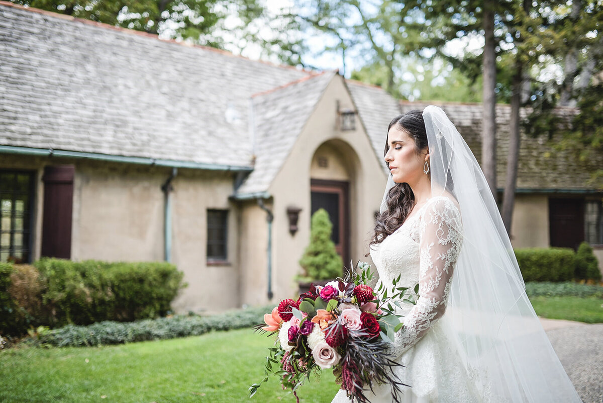 An elegant black tie garden wedding at Planterra Conservatory in West Bloomfield Michigan provided by top rated Metro Detroit wedding photographer Kari Dawson5