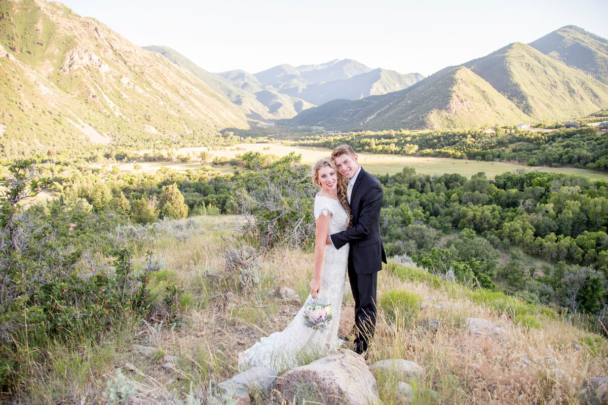 a bridal couple in the mountains