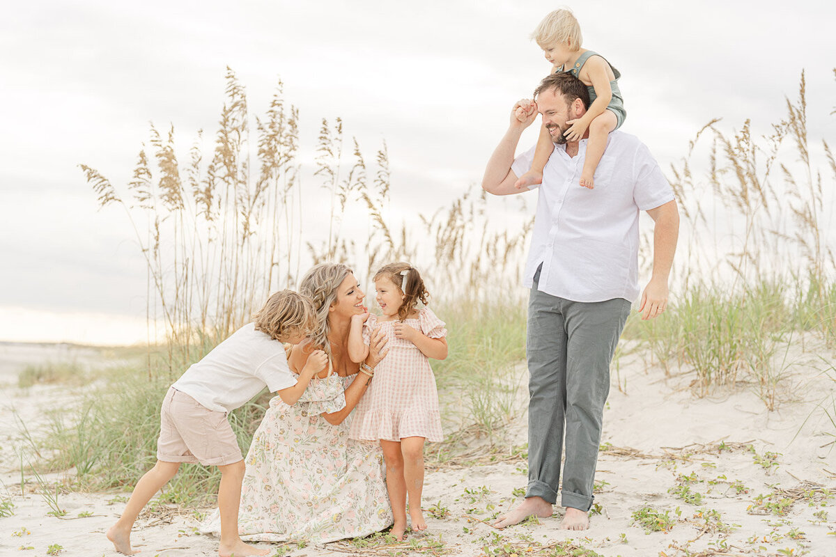 parents and kids playing together during Manassas, VA family pictures