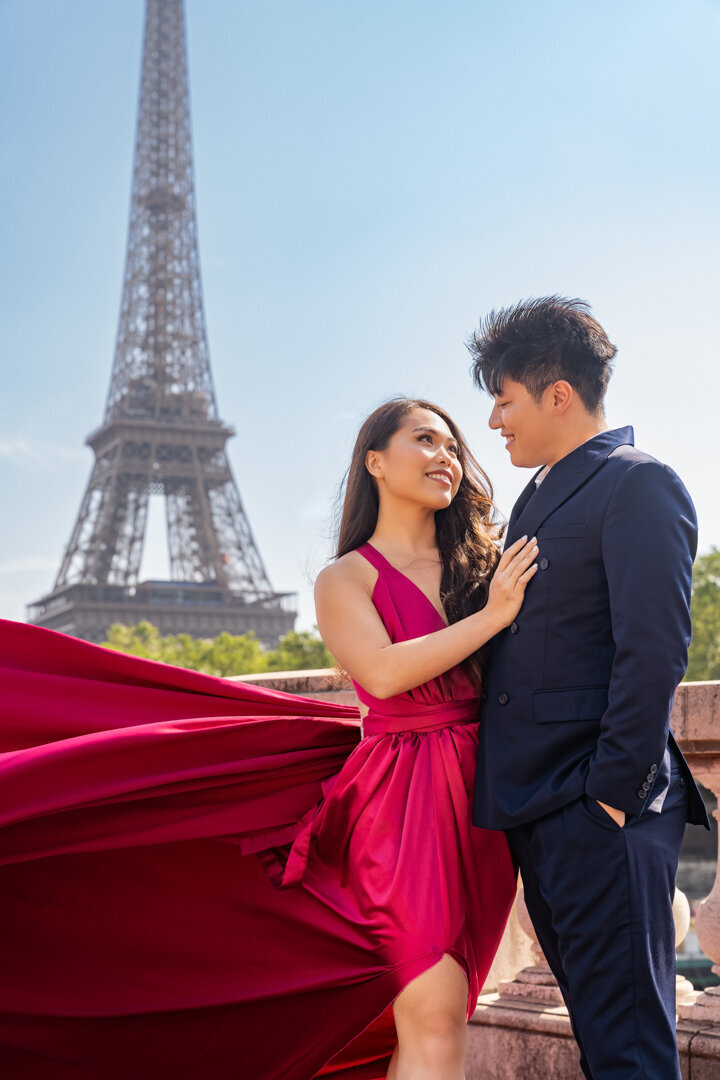 Intimate couple close-up portrait, Eiffel Tower Paris backdrop, romantic photography