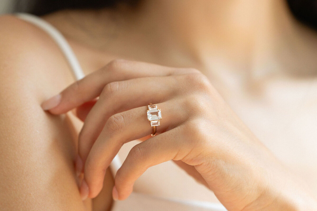 Three stone emerald cut engagement ring by Ma Folie Gems, romantic and modern wedding jewelry based in Vancouver.  Featured on the Brontë Bride Vendor Guide.