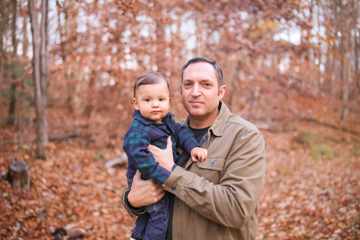 father holding son at Woodruff Park in Columbus Georgia by Columbus Georgia family photographer Amanda Richardson Photography