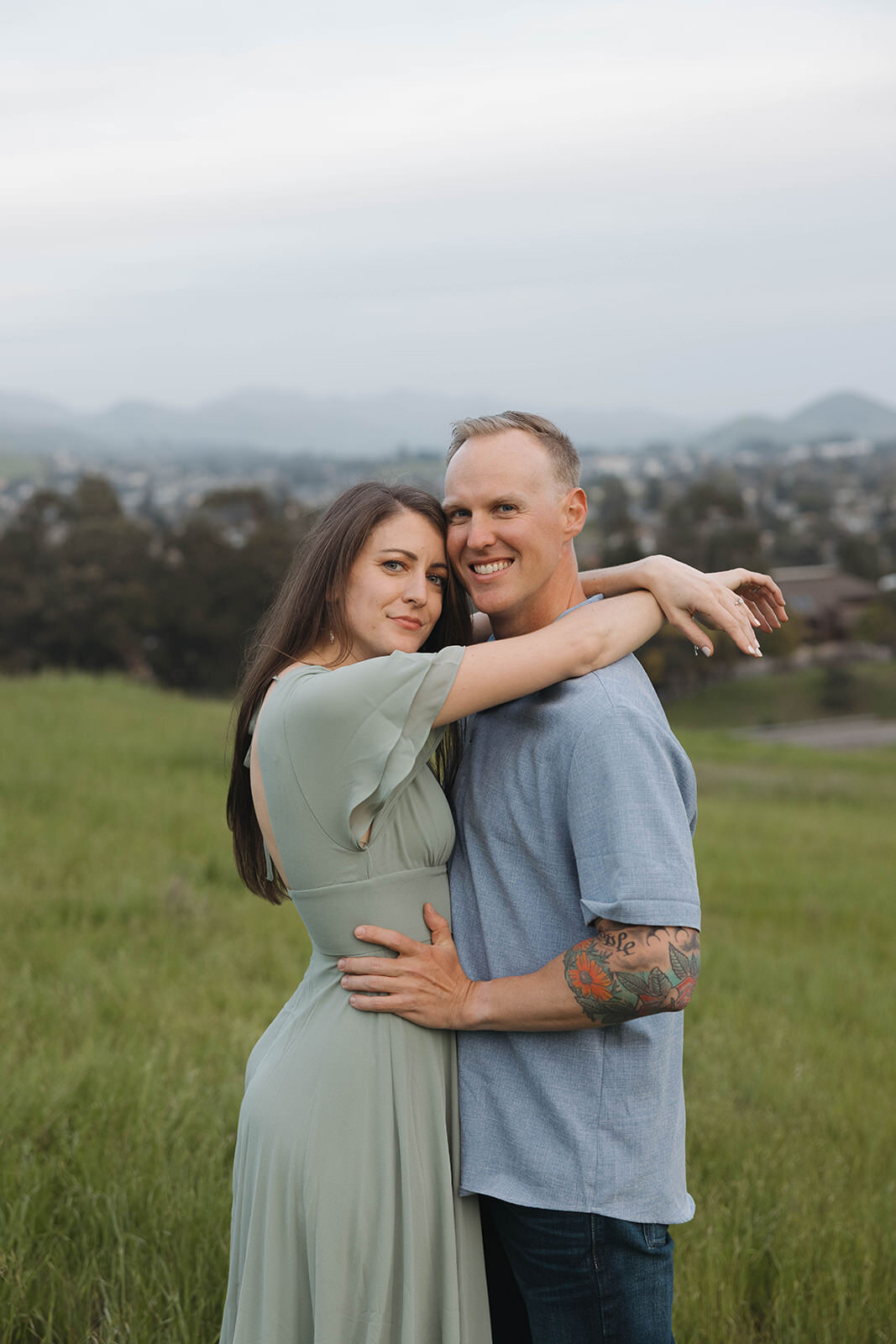 Nicolette and Alex laughing during their engagement session