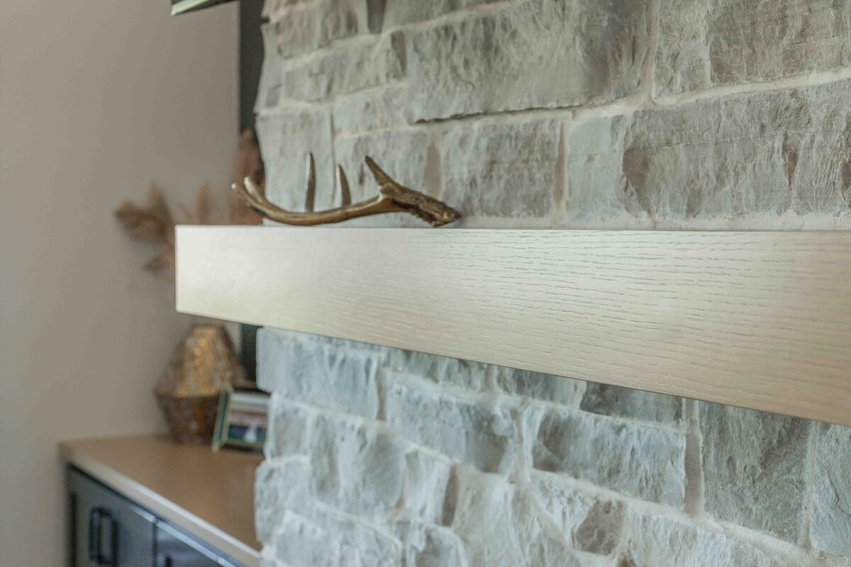 stone details over fireplace