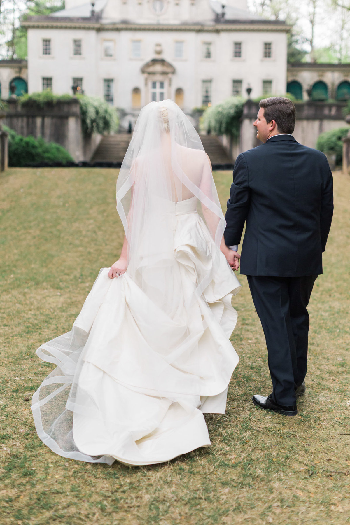 This Oscar de La Renta gown had so much movement in the train. Photo by luxury destination wedding photographer Rebecca Cerasani.