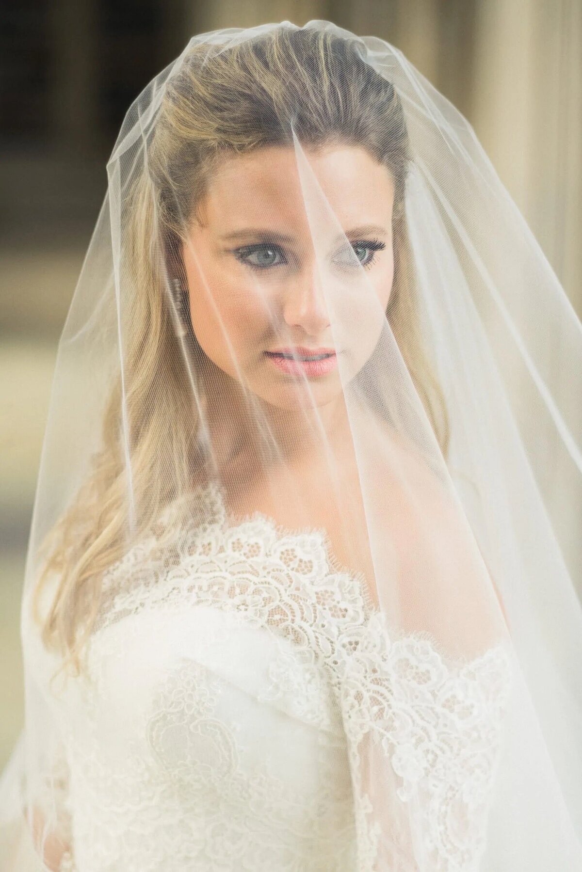 a veil covering a bride's face