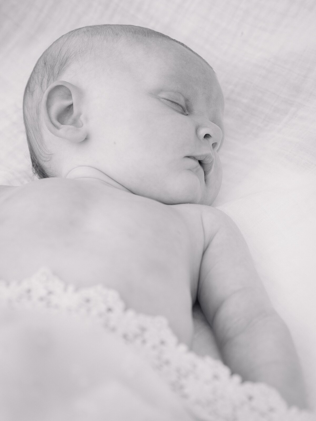Black-and-White-Baby-Sleeping-on-Back-Bainbridge-Tallahassee.jpg
