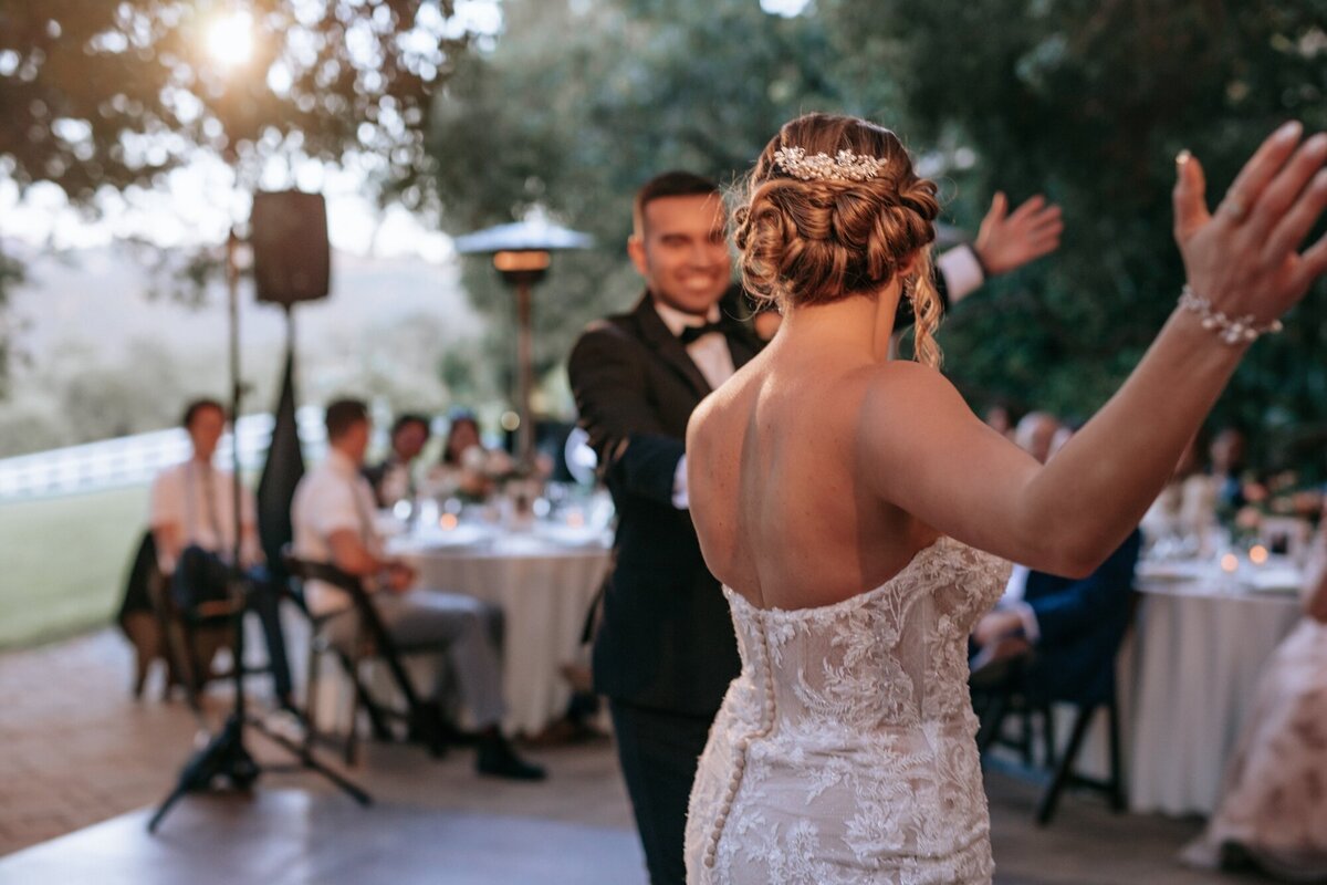 Bride and Groom dancing on the dance floor during their outdoor reception in Temecula CA.