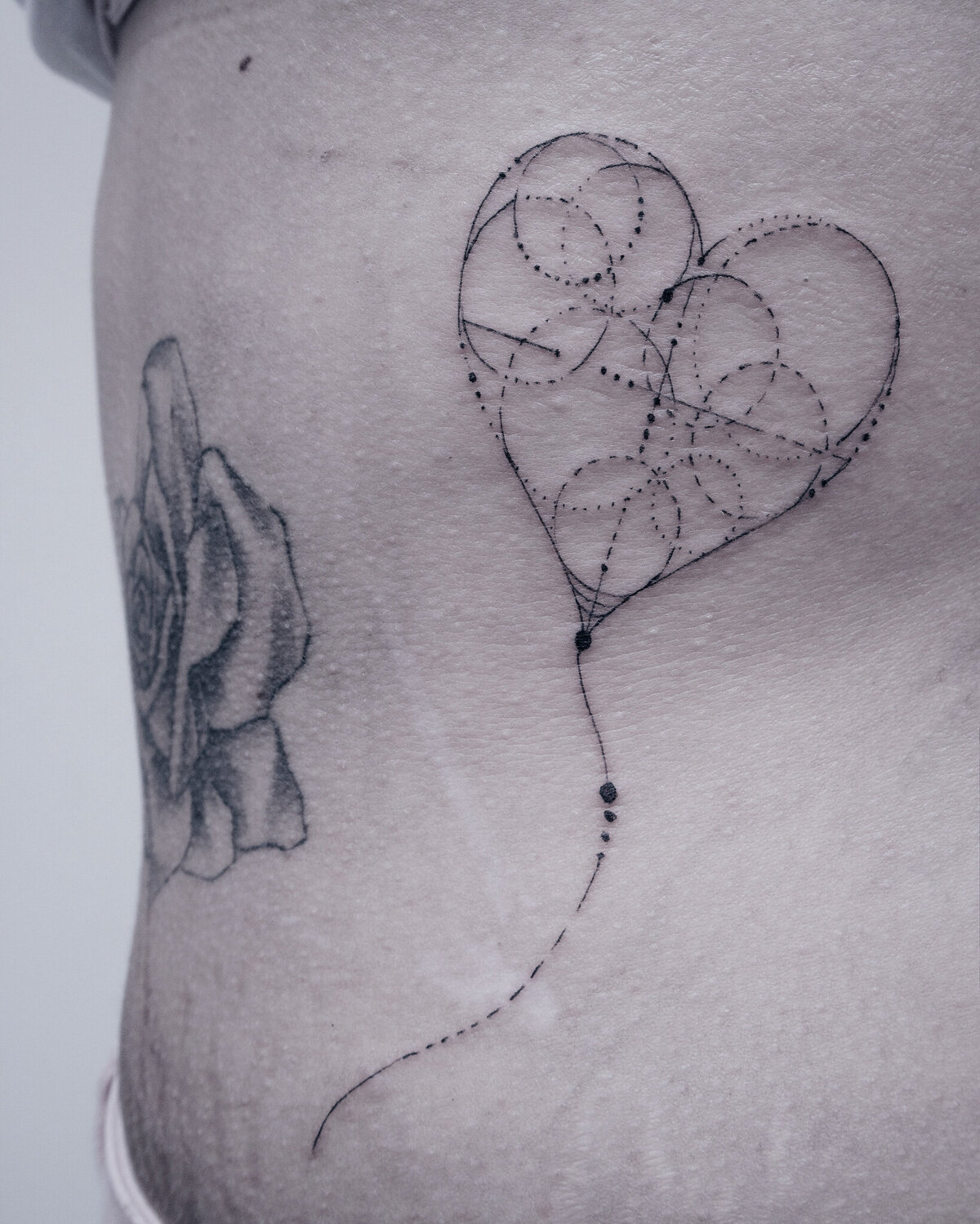 heart tattoo, minimal tattoo, fine line tattoo