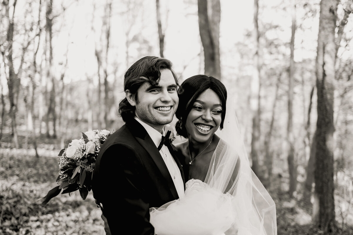 an elegant black and white photo of the married couple