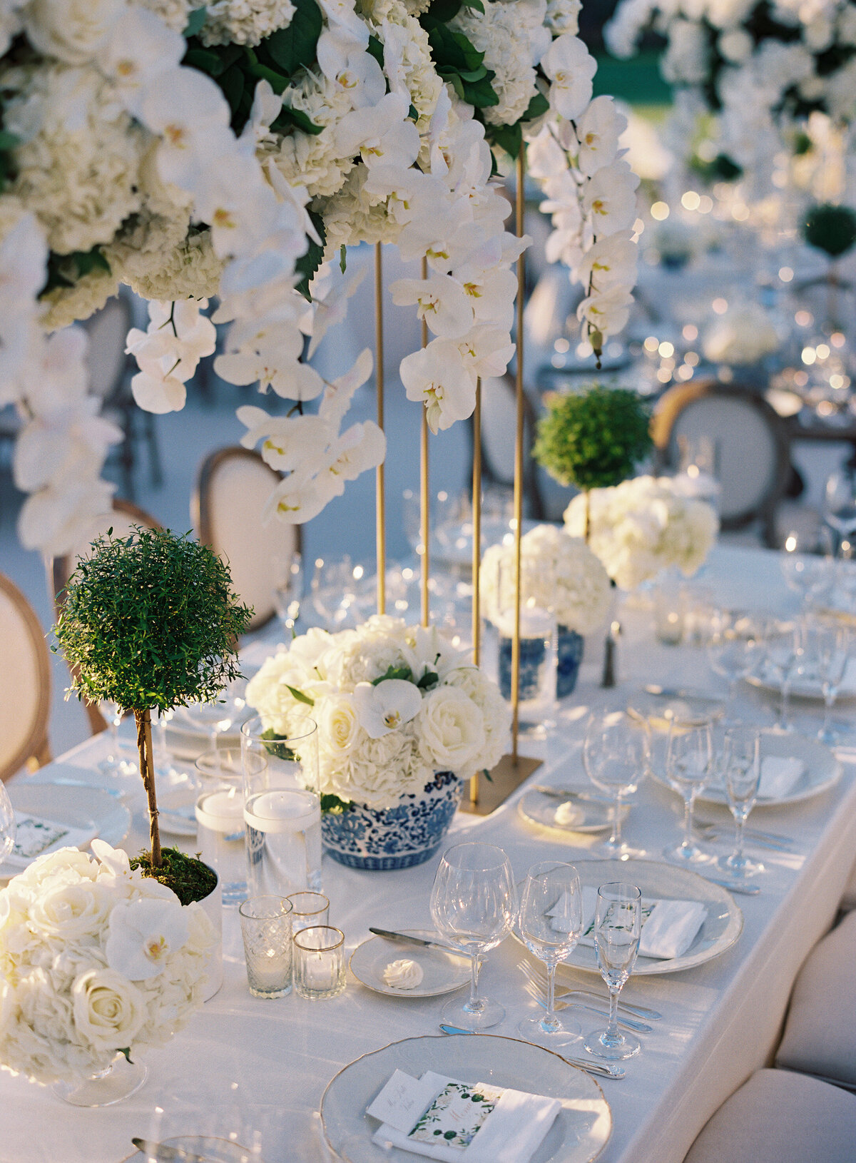 An elegant set up of the wedding table for the wedding at the Onwentsia country club. 