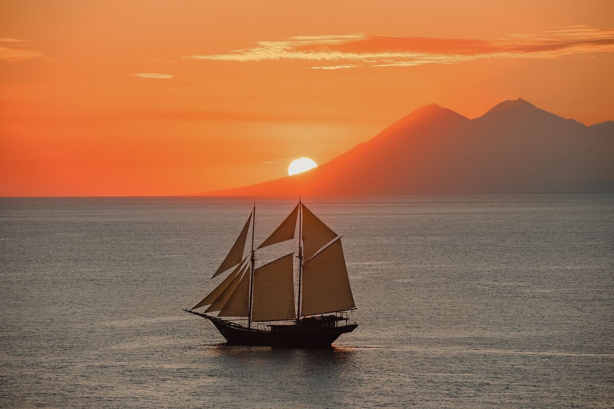 Amandira Luxury Yacht Charter Indonesia Volcano Sunset