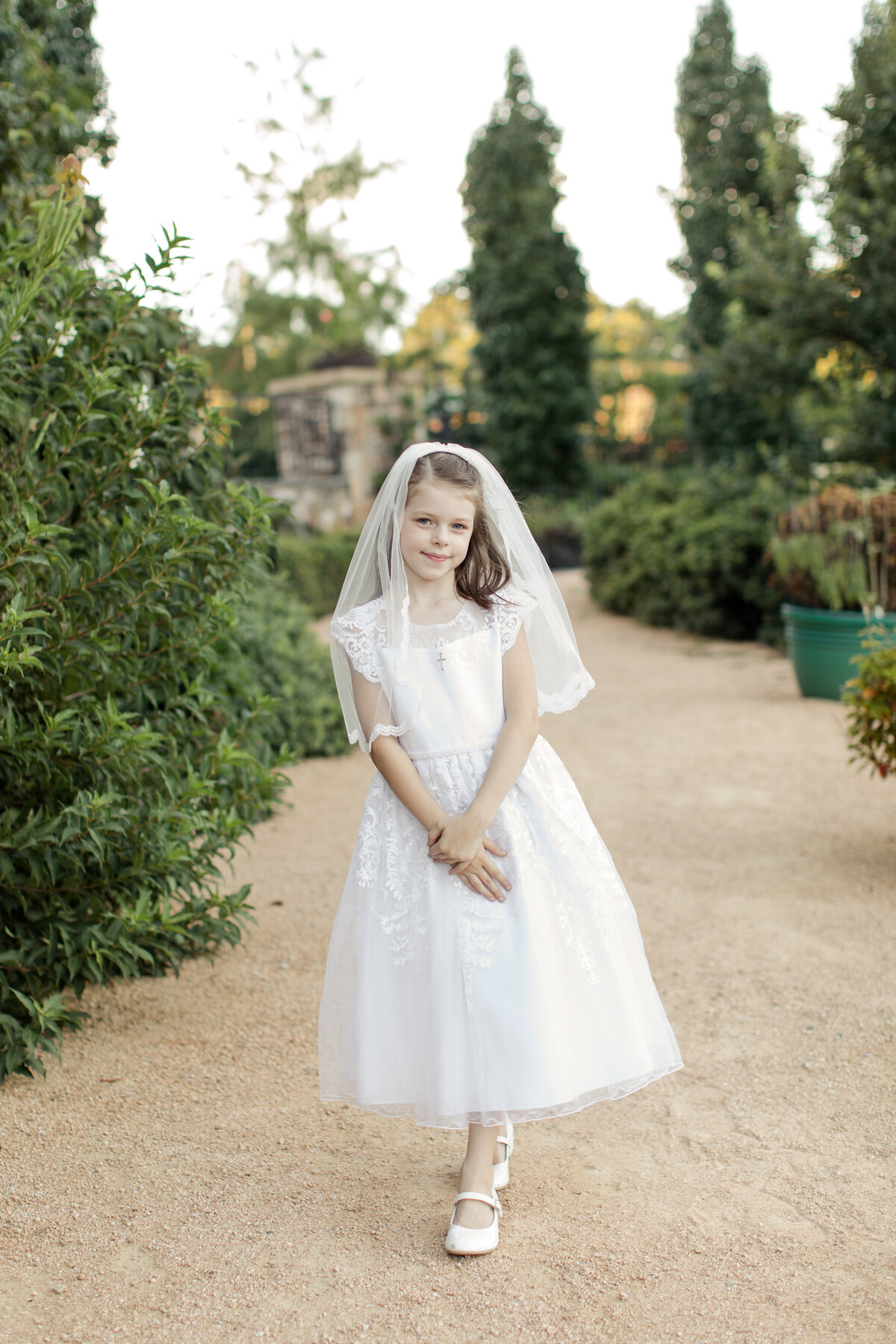 first communion girl walking
