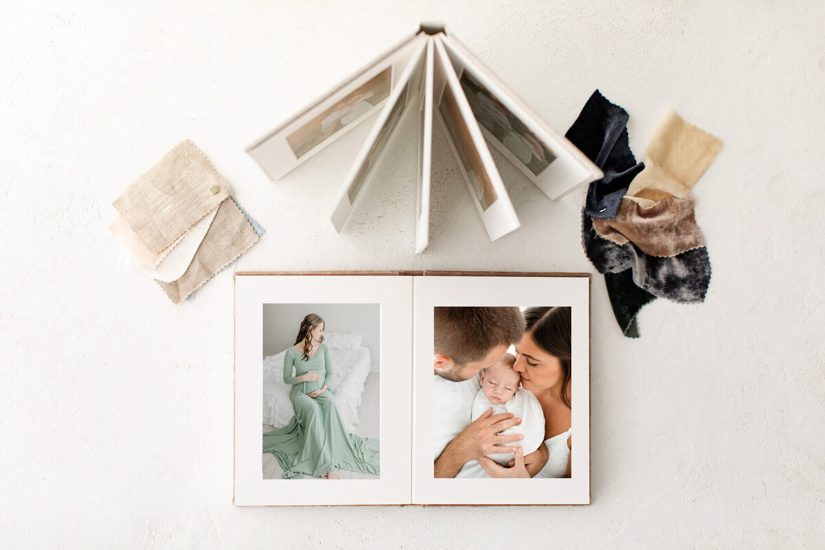 Beautiful album and linen and velvet sample mock up of maternity images