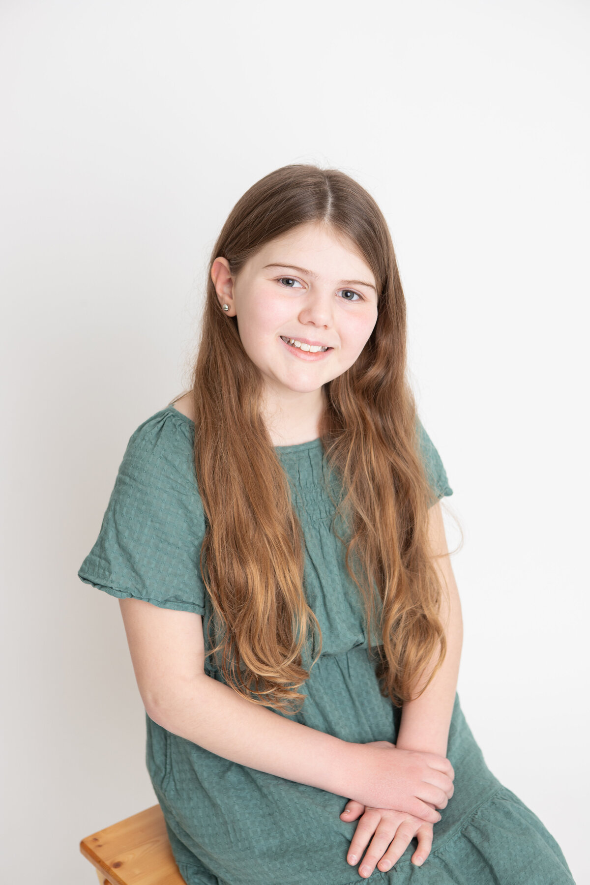 Young actress headshots sitting