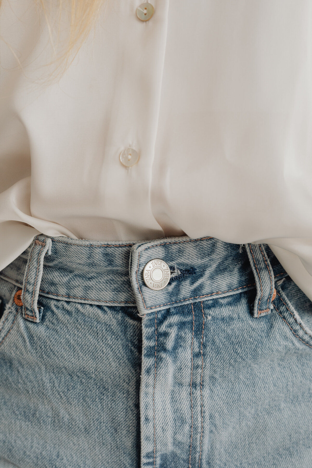 kaboompics_light-blue-jeans-white-silk-shirt-27724