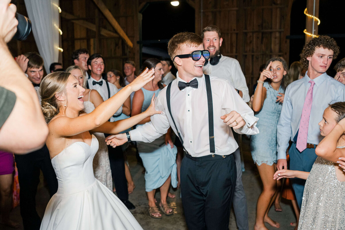 Bride and groom partying at reception