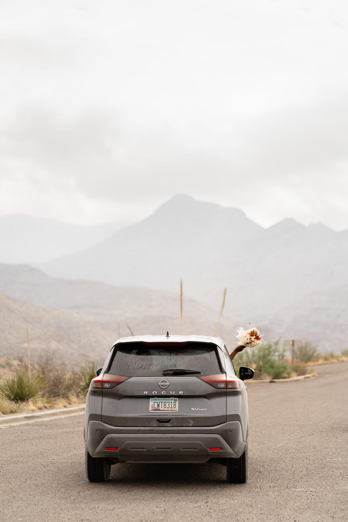 couple drives off after elopement