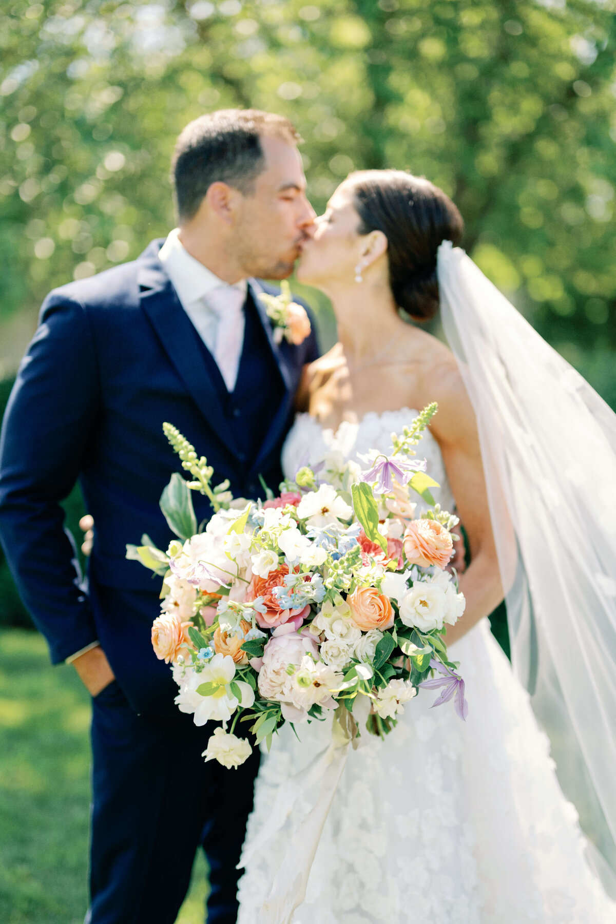 bride and groom kissing