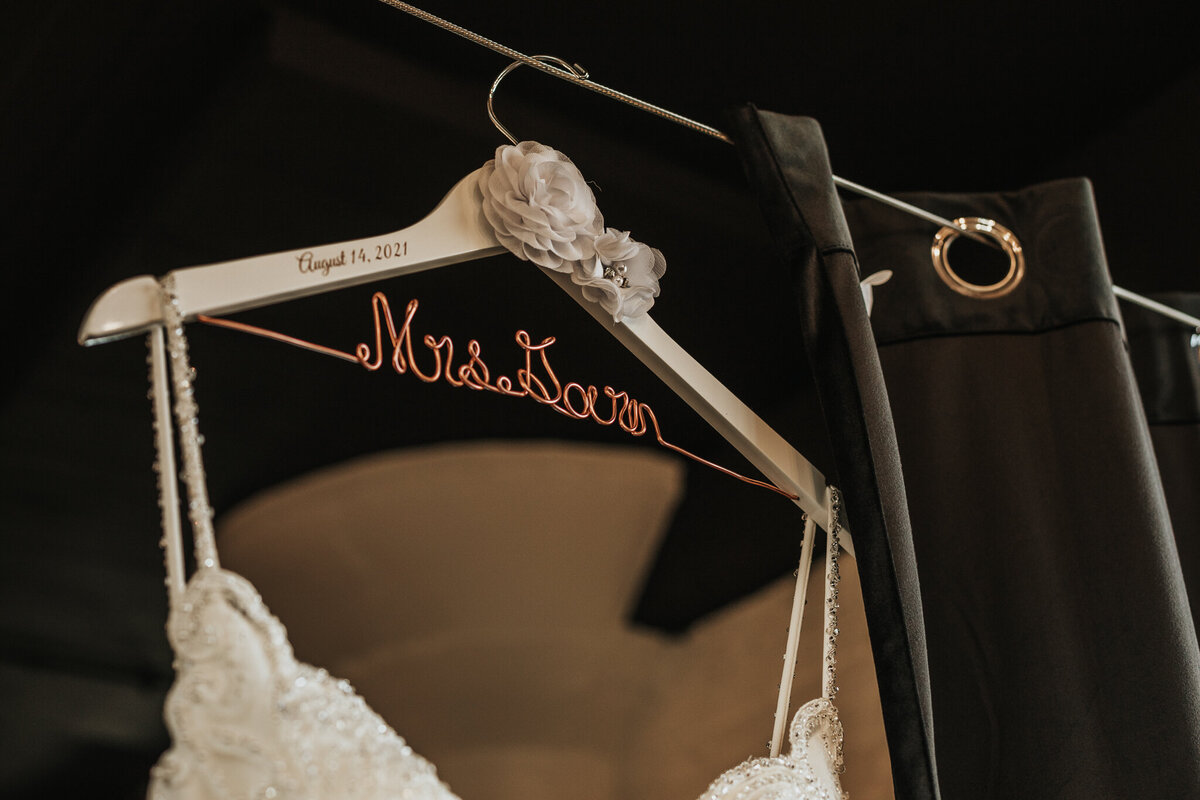 Bridal dress hanger detail shot