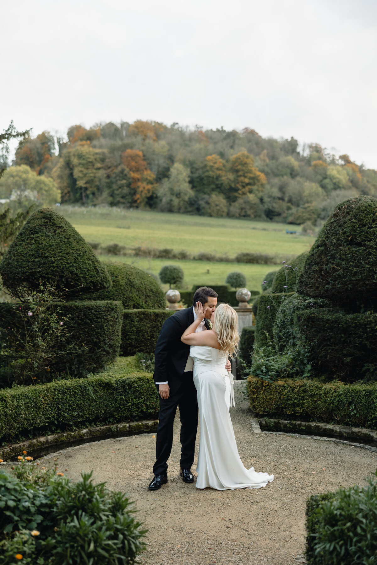 Editorial couple portrait at Cotswolds wedding