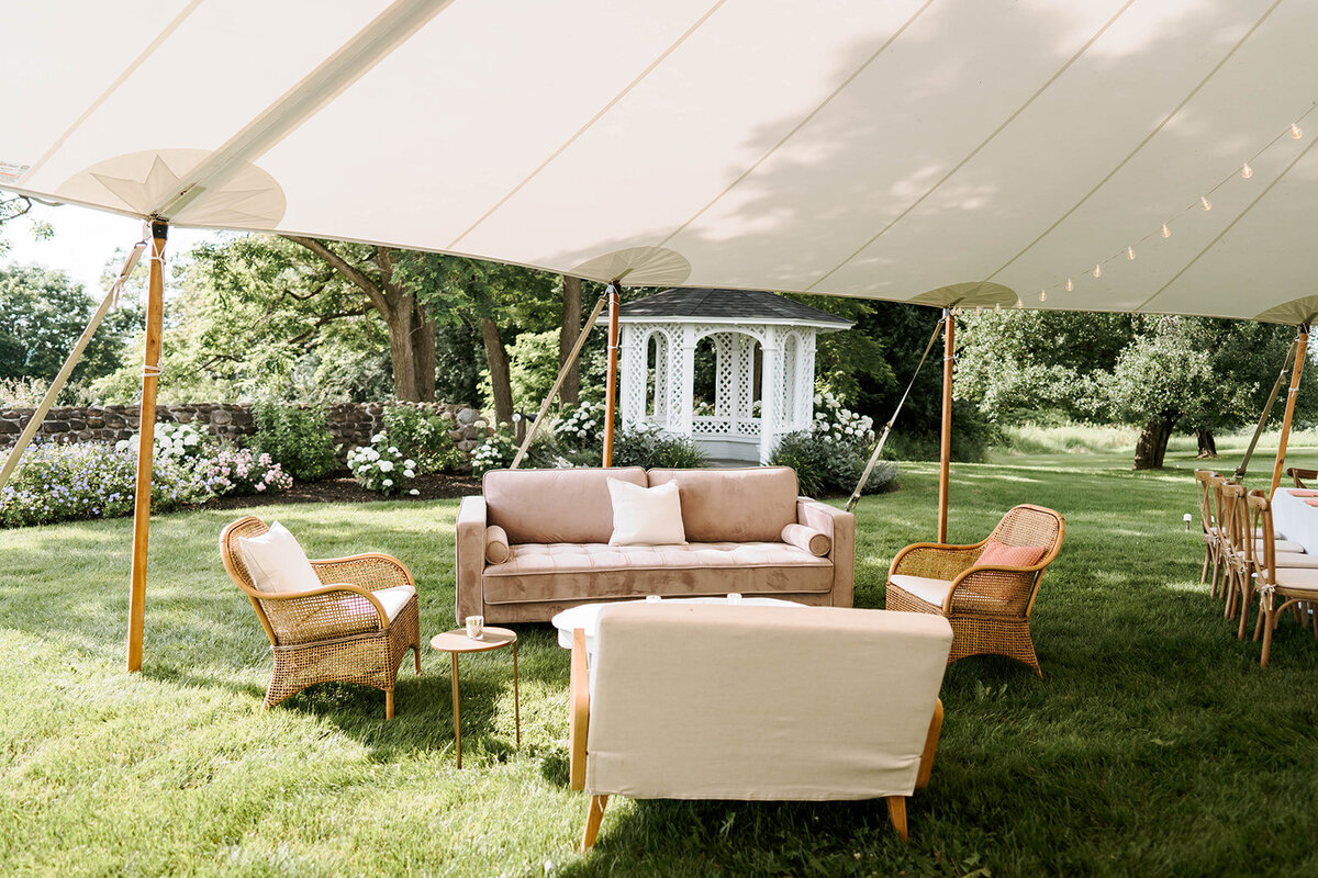 neutral wedding reception lounge in tent at upstate new york wedding venue
