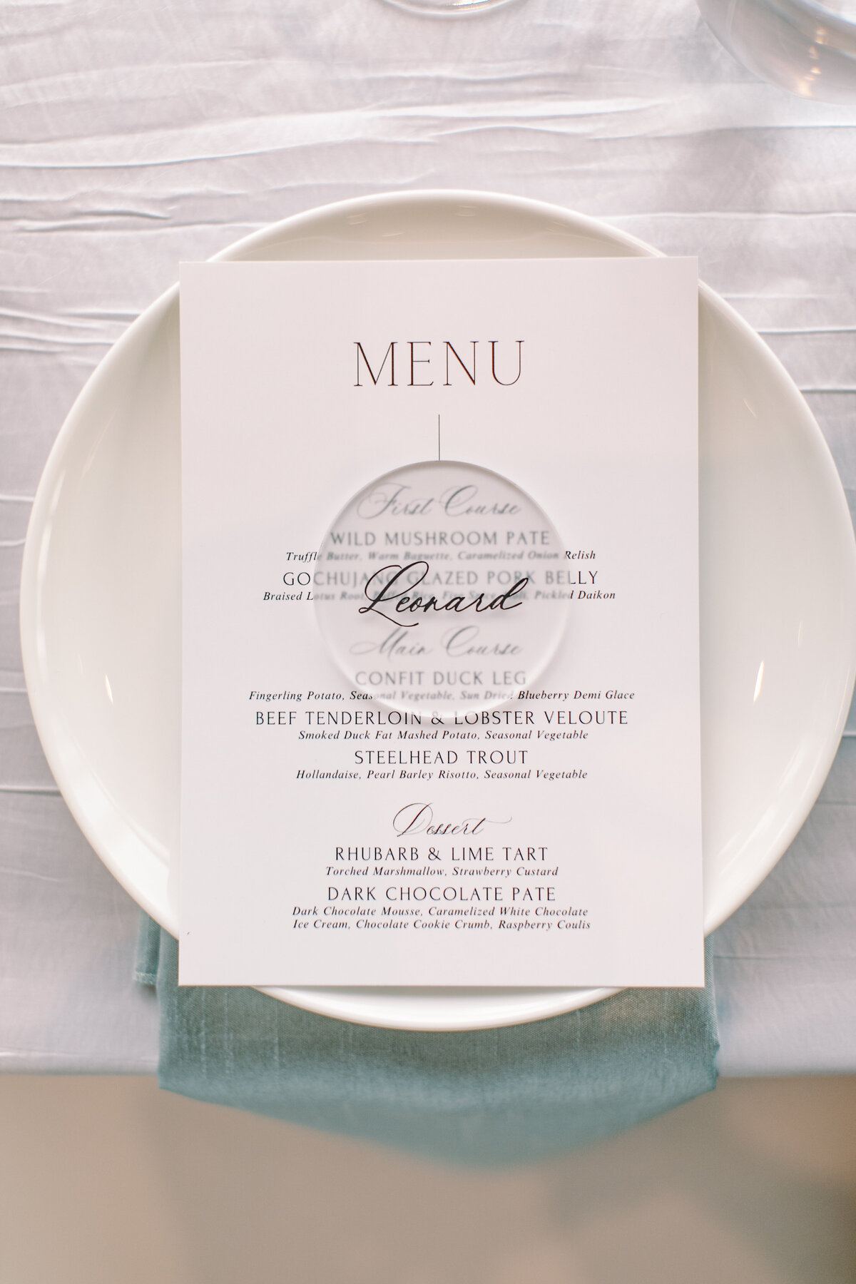 wedding table place setting, black and white modern menu, frosted acrylic placecatd with grey calligraphy, modern wedding design by Alberta Wedding Designer, Rebekah Brontë