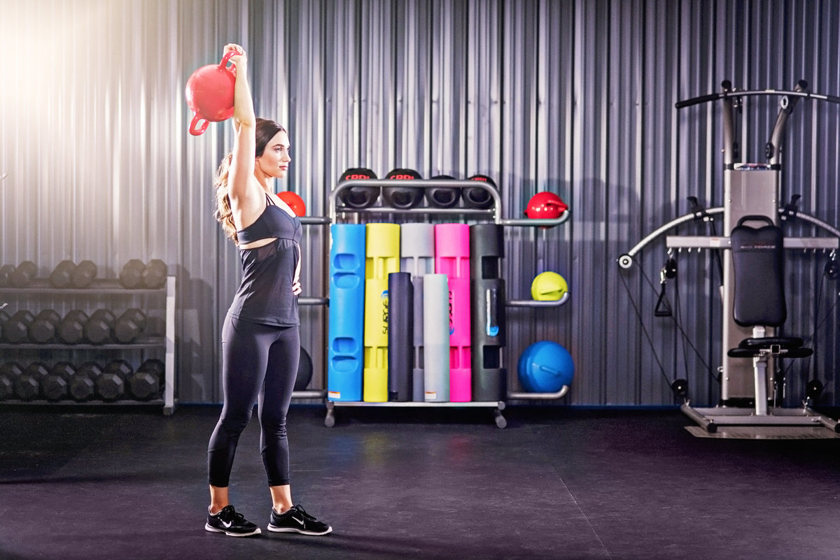 Advertising fitness photograph of a model in a gym