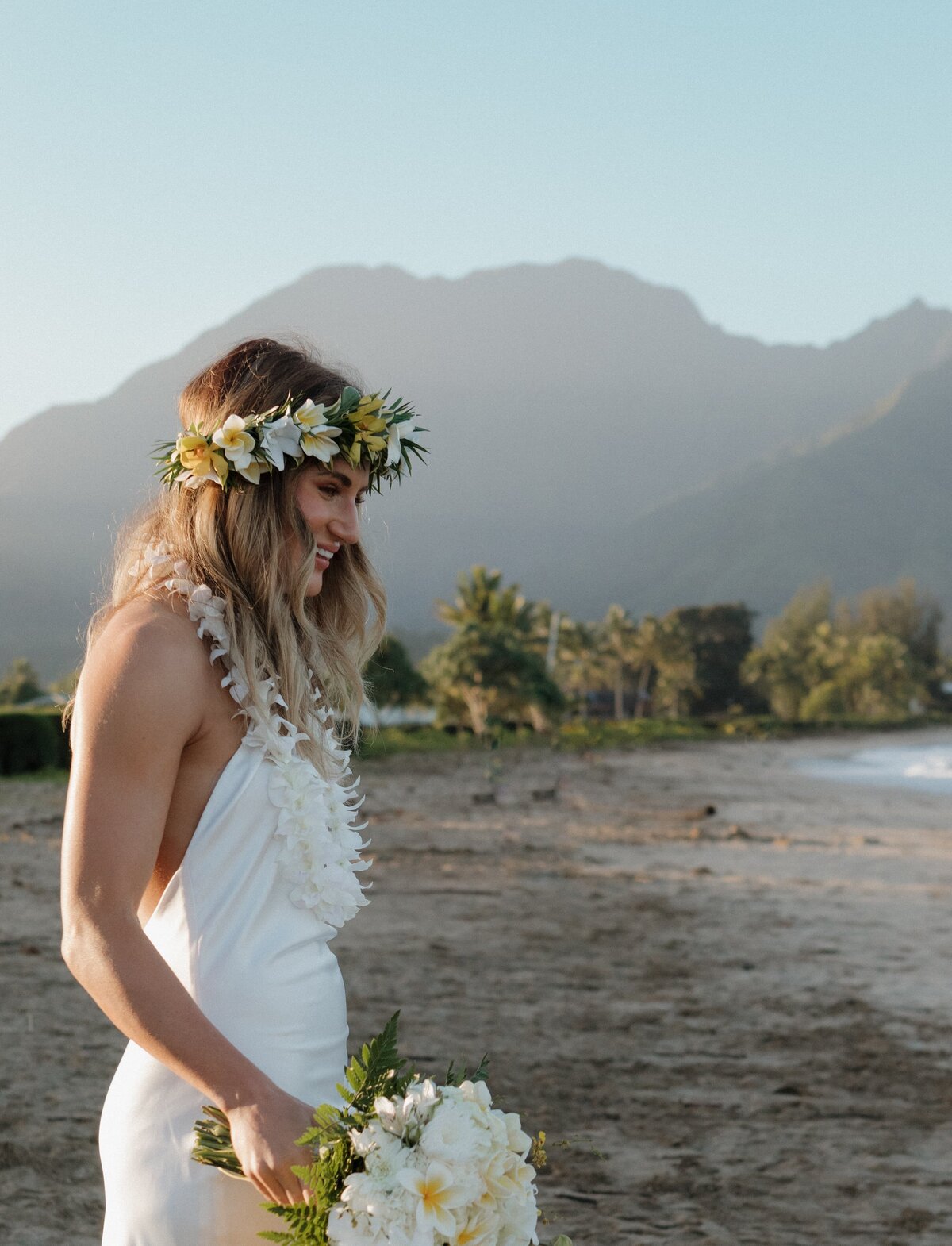 bride on beach in kauai
