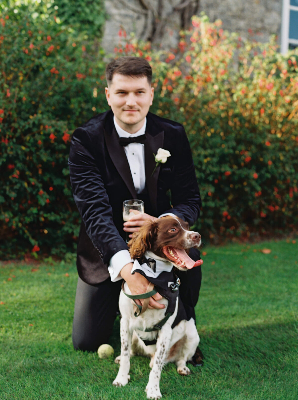 A wedding photo of the groom with his dog at Luttrellstown Castle