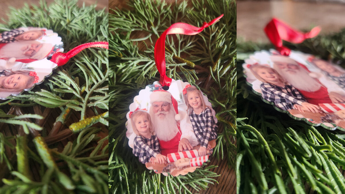 Santa pictures Atlanta scalloped metal ornaments with Santa pictures on them laying in greenery