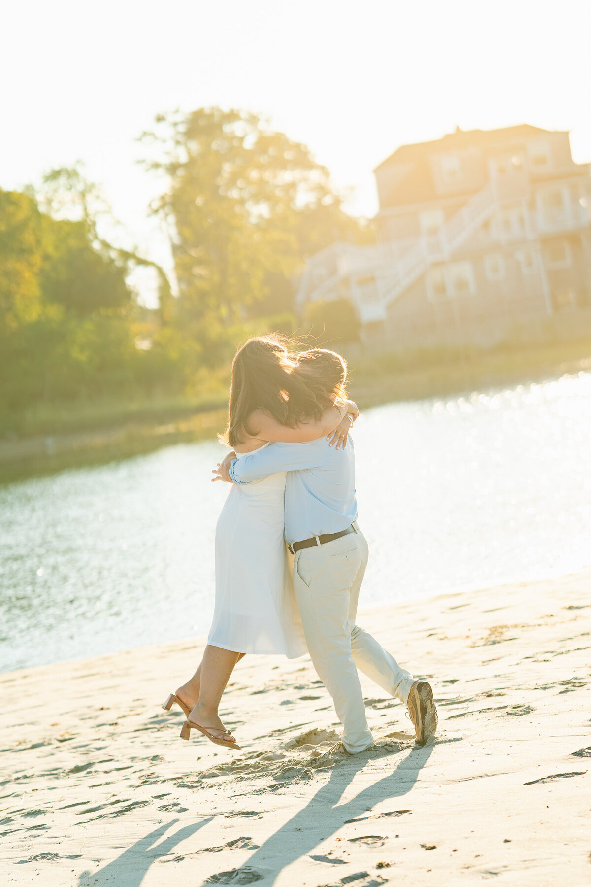 Massachusetts coastal engagement photographer capturing emotional portraits at Good Harbor Beach.