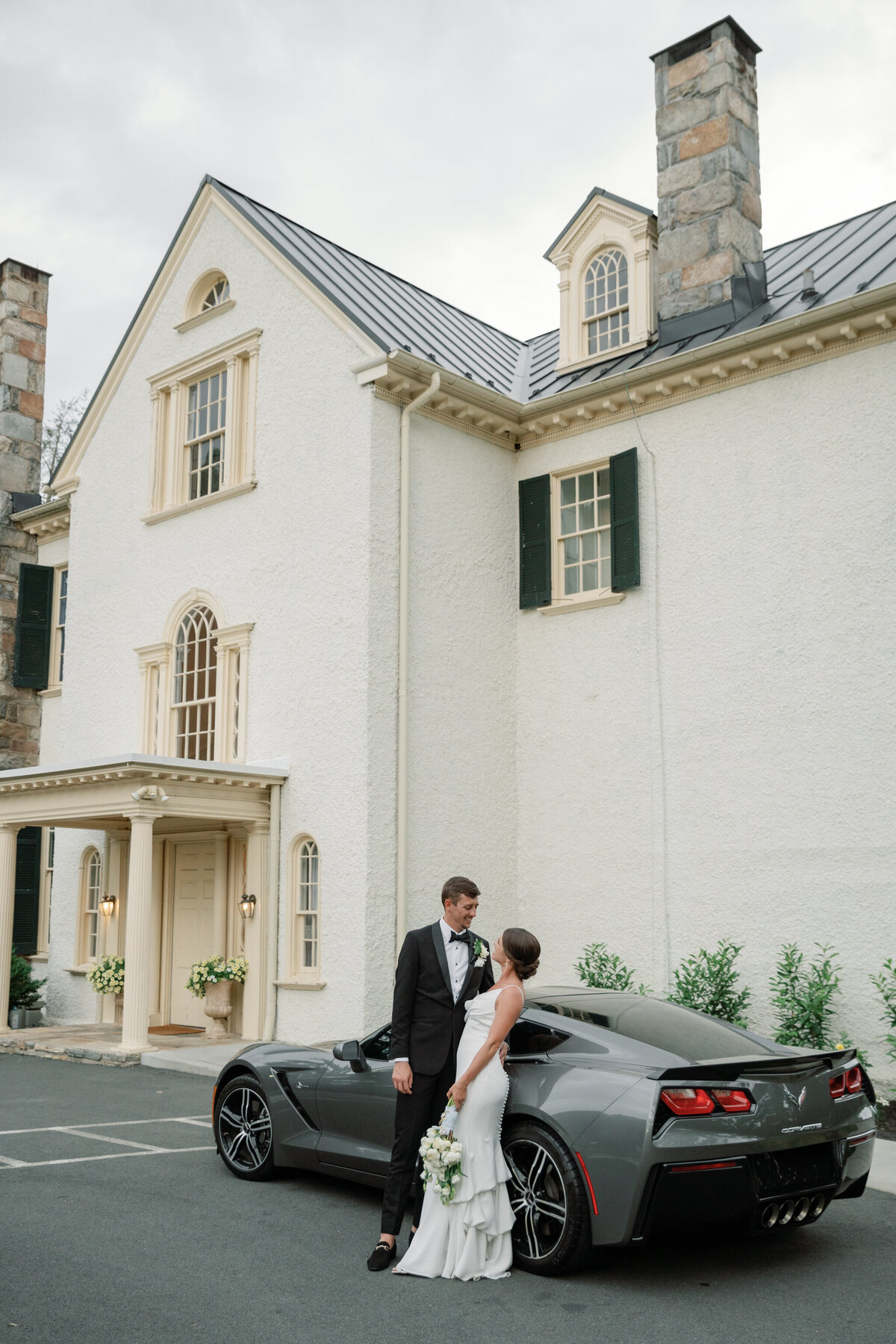 Rust Manor House | bride and groom with getaway car