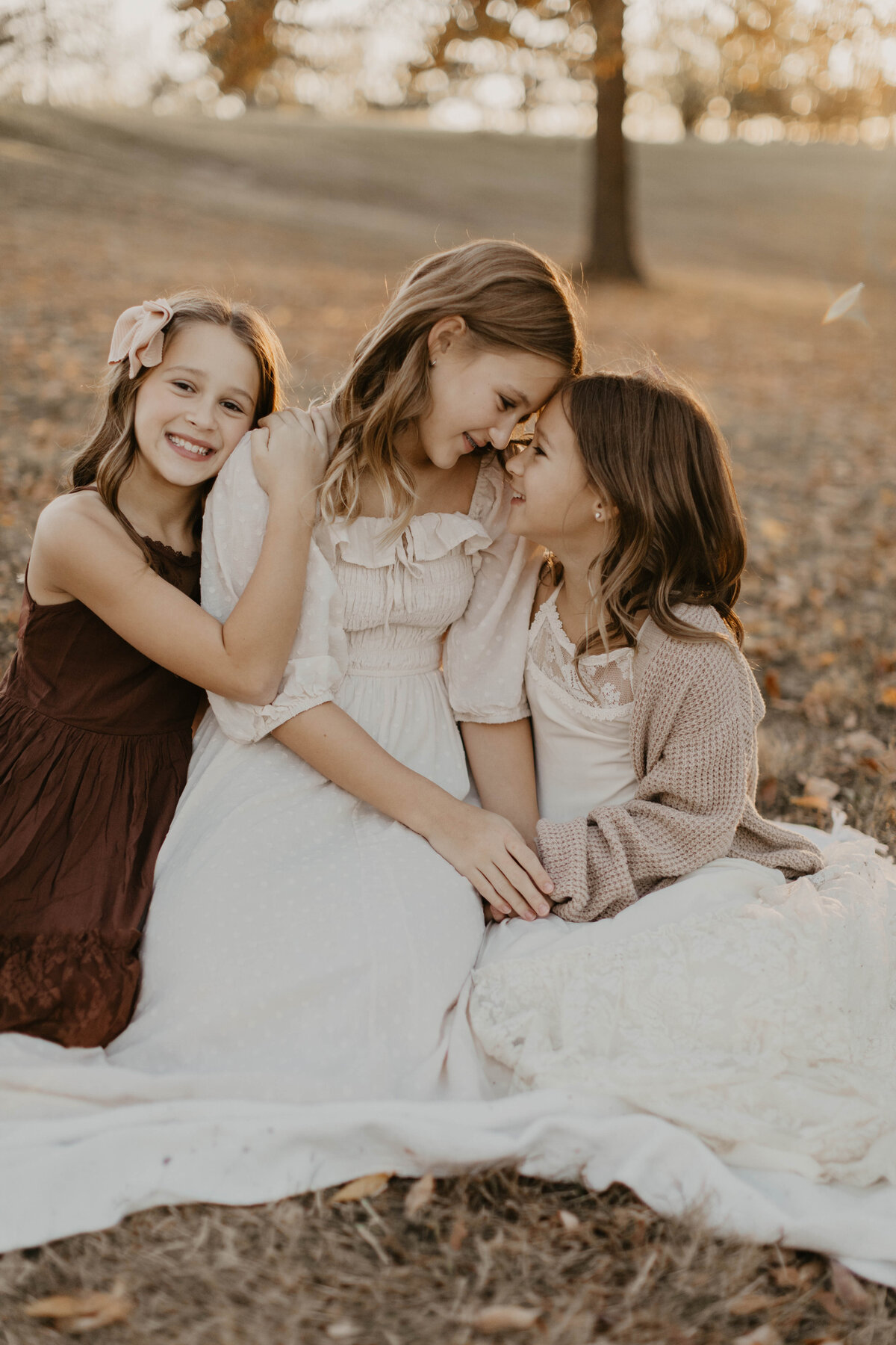3 daughters embracing. 