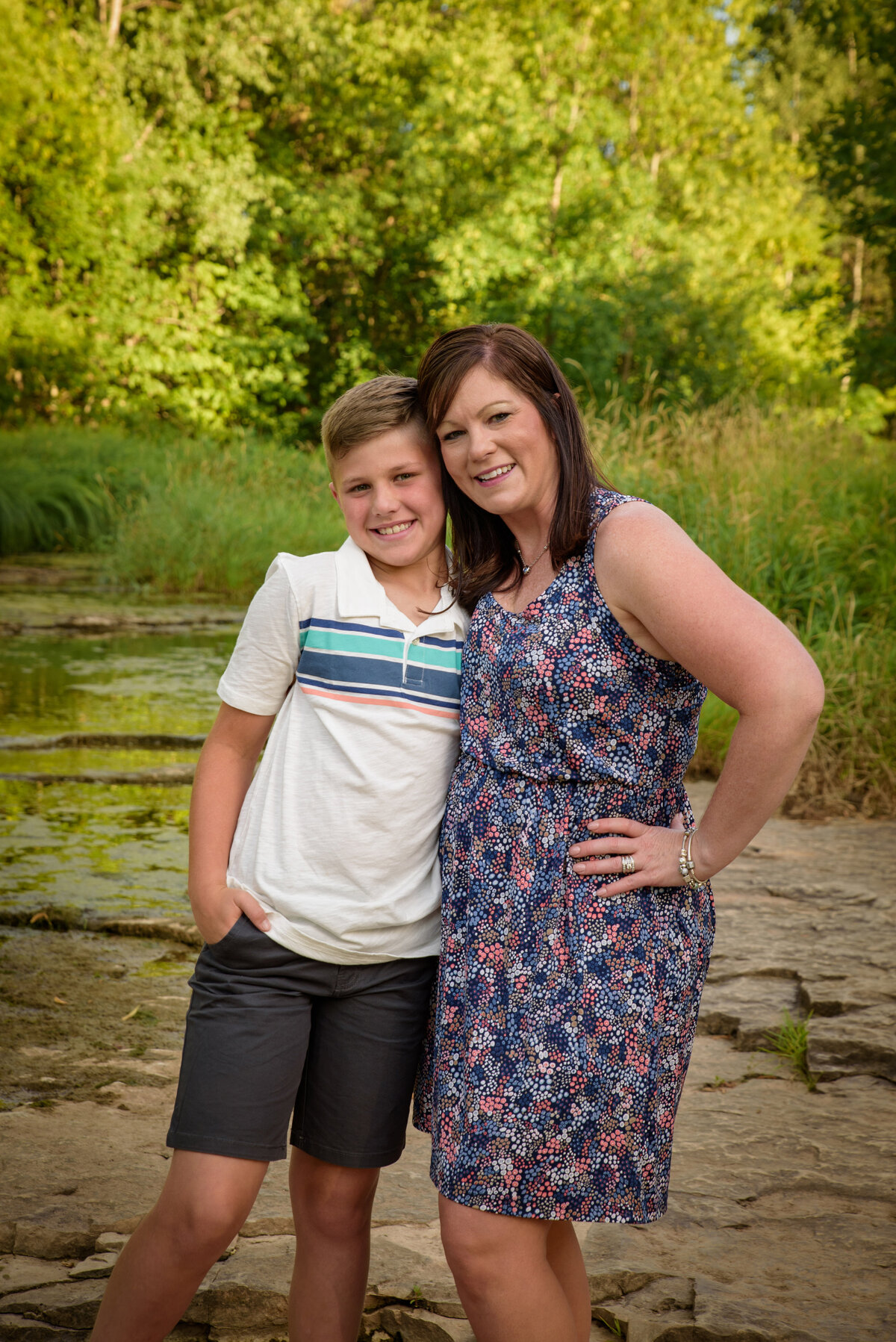 Mother and son portrait standing near creek at Fonferek Glen County Park near Green Bay, Wisconsin